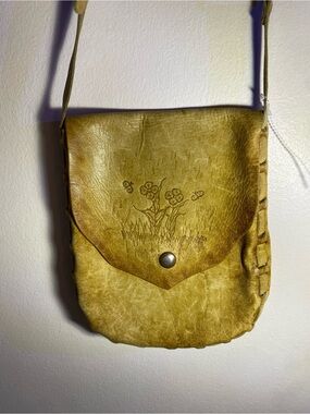 Handcrafted Yellow Leather Crossbody Bag with Floral Embossing